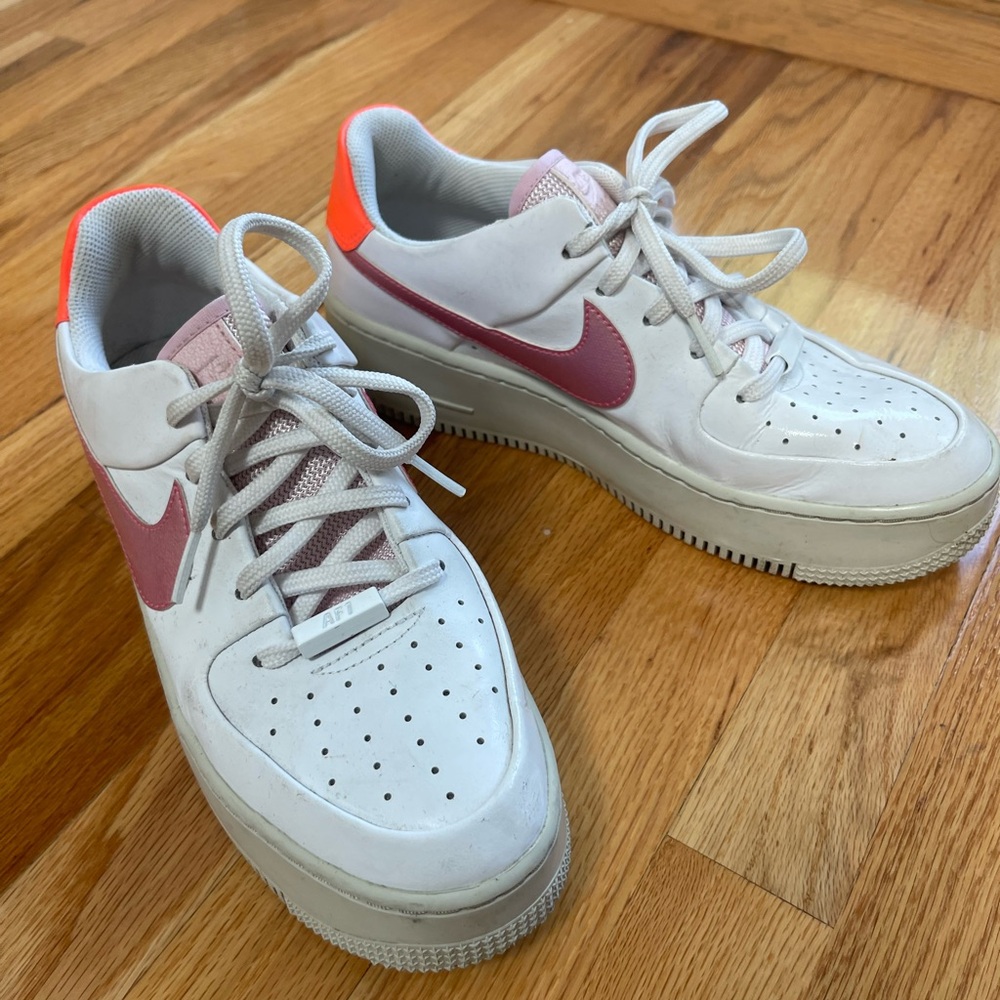 Nike Women's White and Pink Sneakers with Red Accents
